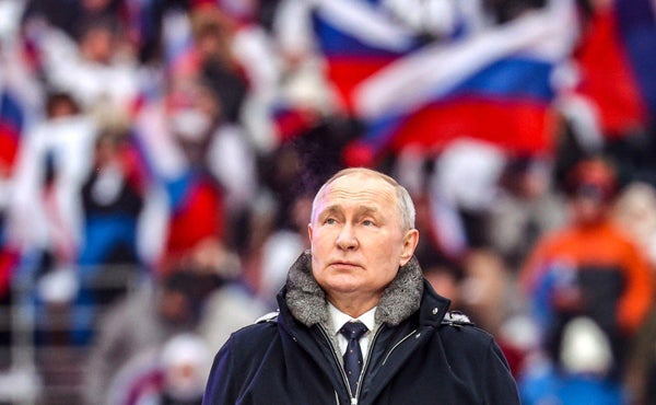 Vladimir Putin with crowd in background