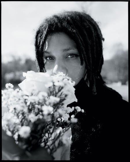 Woman smelling flowers