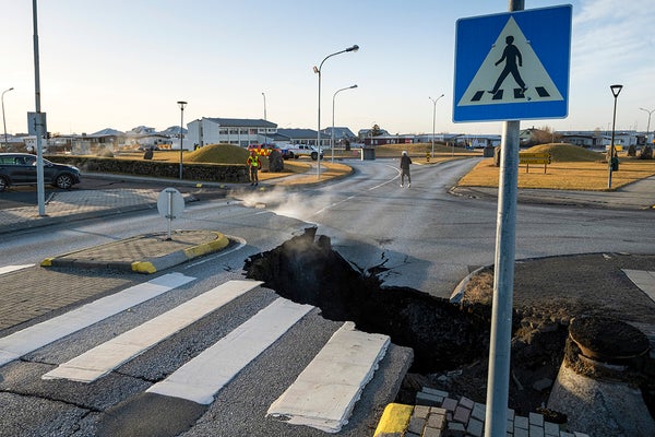Image shows a crack cutting across the main road in Grindavik, southwestern Iceland following earthquakes.