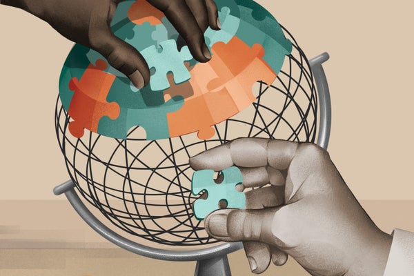 Illustration of hands putting together a world globe using puzzle pieces.