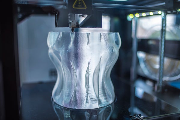 Close up shot of 3D printer printing 3D vase