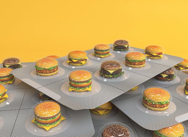 Artist rendering, multiple blister pill packs piled on top of each other with 8 compartments each, in place of a pill in each compartment is a cheeseburger