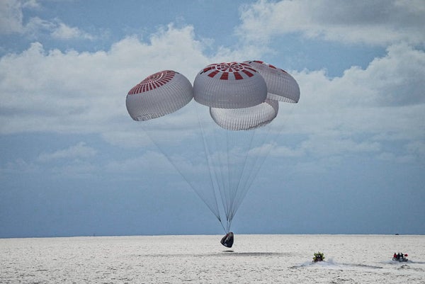 The Crew Dragon Resilience splashes down in the Atlantic Ocean off the coast of Florida.