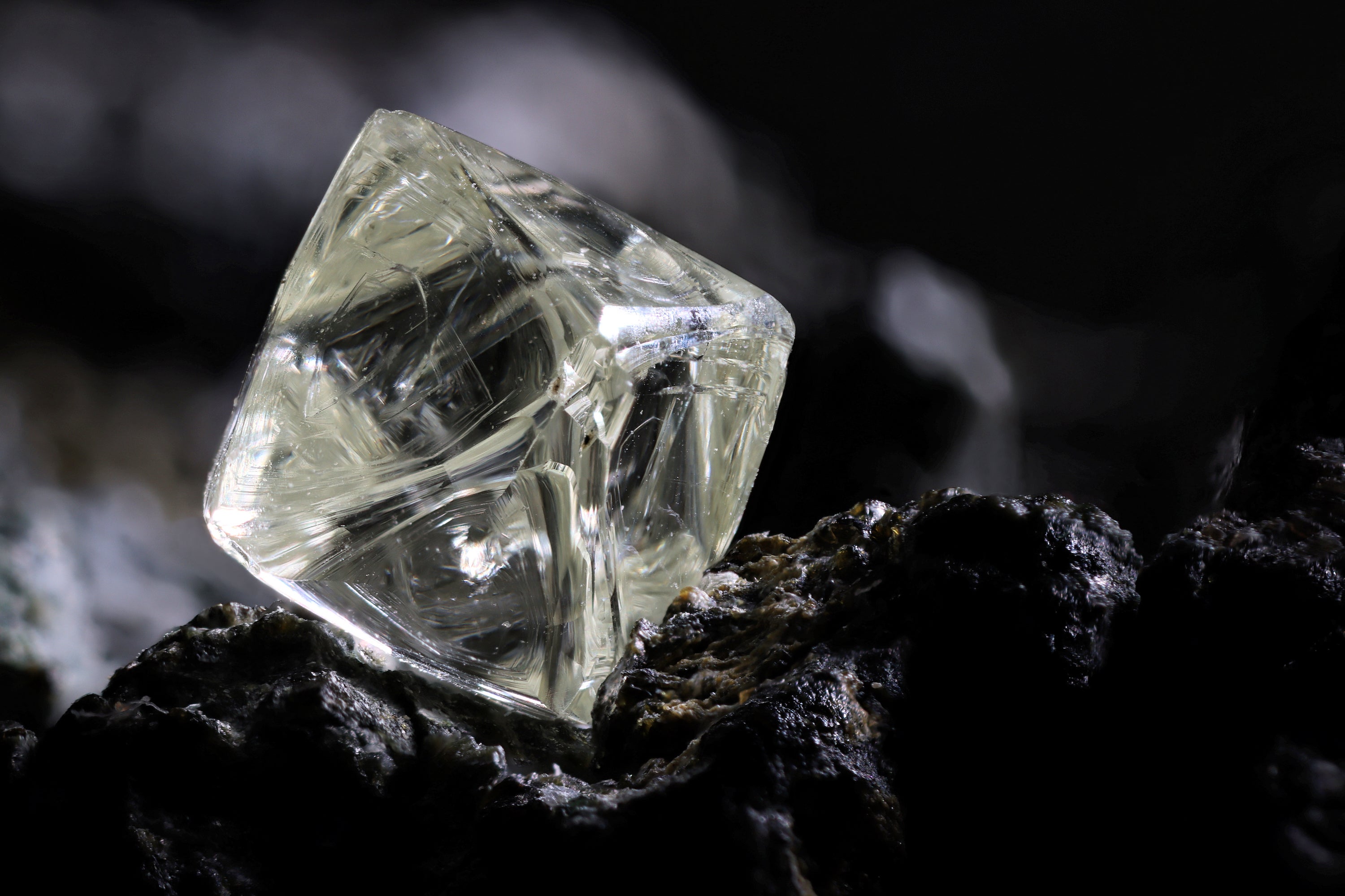 This is a natural piece of kimberlite with a rough Diamond still