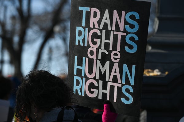 Sign reading TRANS RIGHTS are HUMAN RIGHTS