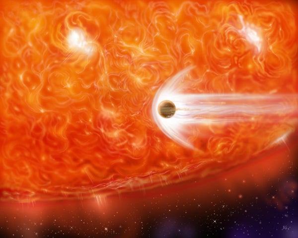 An artist's impression of red giant star engulfing an accompanying planet.