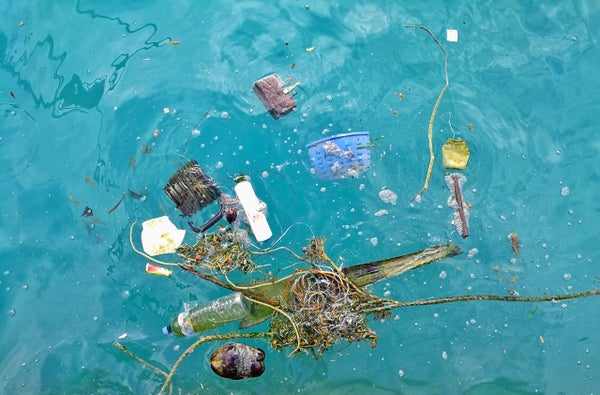 High Angle View Of Garbage Floating On Sea