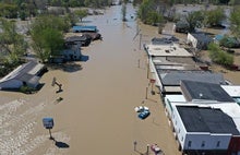 Torrent Breaks Michigan Dam and Reveals Climate Risks