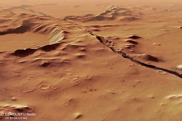 An aerial view of a surface fracture on Mars.
