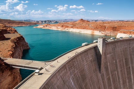 Tourists walking on Glen Canyon dam on the Colorado River.