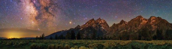 MILKY WAY glows over Grand Teton National Park in Wyoming