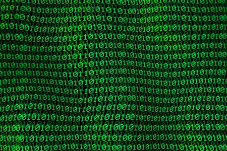 Green binary code in a 3-dimensional wave pattern on black background