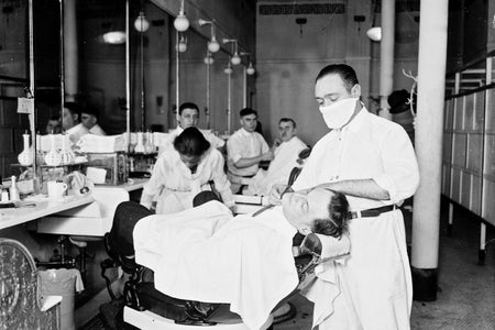 Barber, Wearing An Influenza Mask, Shaving A Man's Face