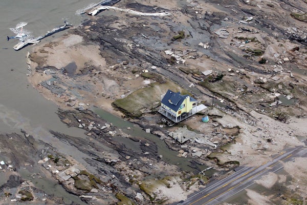 Aerial of a home left standing among debris from Hurricane Ike