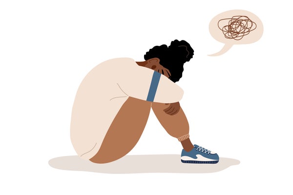 Illustration of sad Black teen girl sitting on floor and crying.