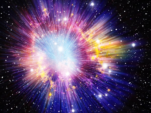 Multicolor light explosion in red, yellow and blue in Universe
