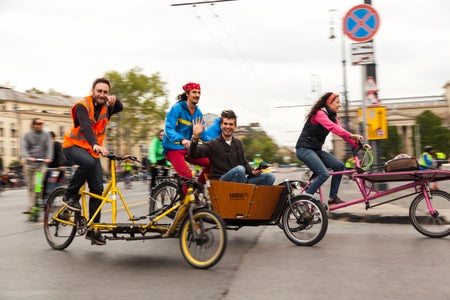 Group of people on cargo bikes in Budapest.