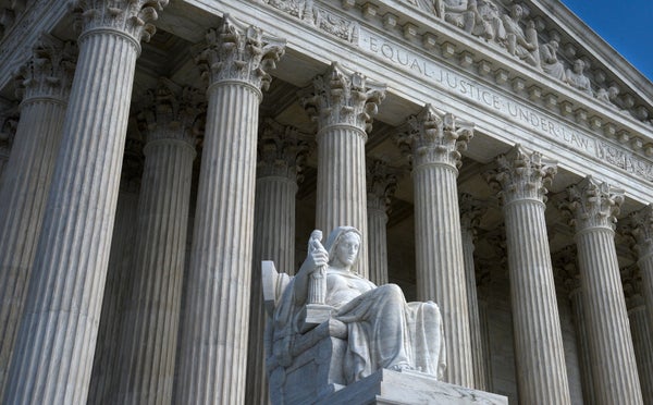 A view of the statue on the steps of the Supreme Court.