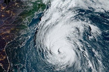 Satellite image of the sun rising over the east coast of the United States and Canada as Hurricane Lee approaches Nova Scotia on September 15, 2023