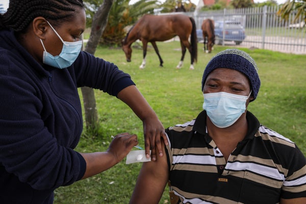 A man in Cape Town, South Africa is given a Covid vaccine.
